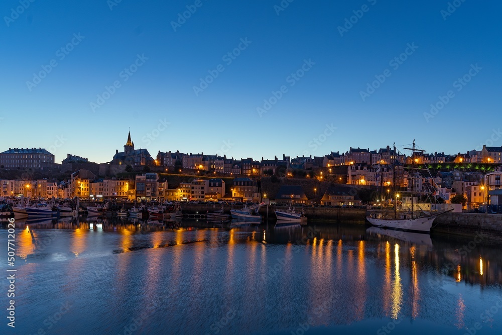 The harbor roadstead of the city of Granville in Europe, France, Normandy, Manche, in spring, at night