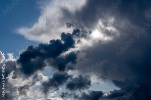 Cloudscape with very bright and very dark clouds © Christian