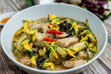 Vietnam traditional street food bun mam vermicelli noodles soup bowl (VIETNAMESE FERMENTED FISH NOODLE SOUP)