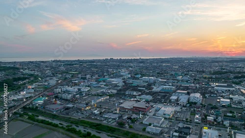 Wallpaper Mural Hyperlapse of bullet trains moving through Japanese city at sunset Torontodigital.ca