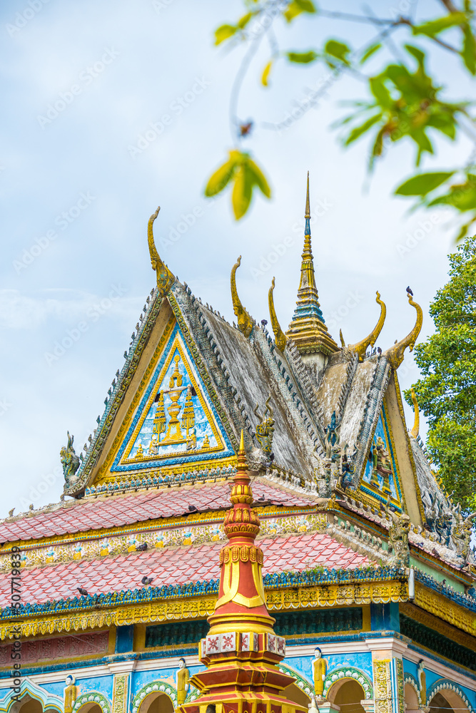 Fototapeta premium view of Chikaeng Krom pagoda in Tri Ton town, one of the most famous Khmer pagodas in An Giang province, Mekong Delta, Vietnam. Travel and religious concept.
