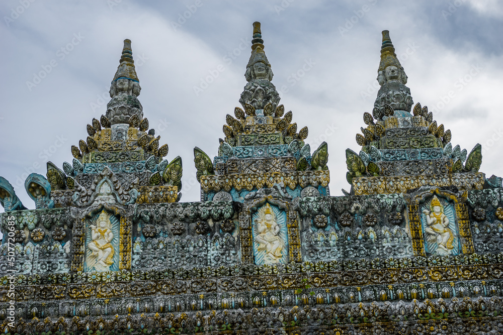 Fototapeta premium view of Chikaeng Krom pagoda in Tri Ton town, one of the most famous Khmer pagodas in An Giang province, Mekong Delta, Vietnam. Travel and religious concept.