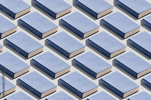 Many blue books on light ba...