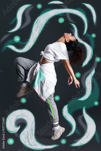 Obraz na plátně Beautiful female African-American hip-hop dancer on grey background
