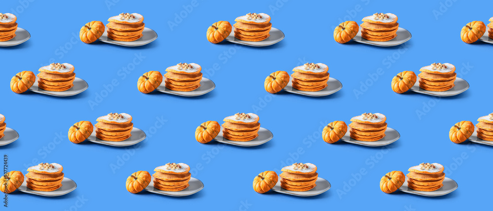 Plate with tasty pumpkin pancakes on color background Plate with tasty pumpkin pancakes on color background