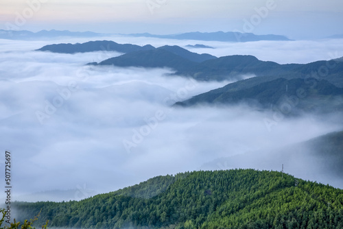 Fairy You sea of clouds and slight visible mountains photo