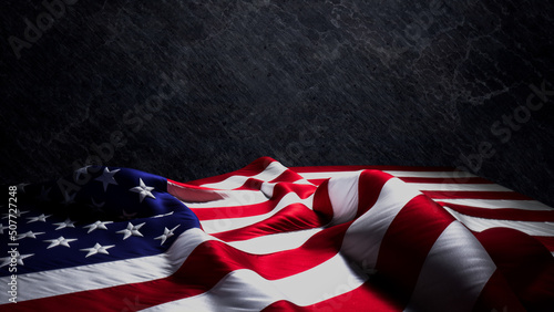Premium Banner for Memorial Day with American Flag, Black Stone Background and Copy-Space. photo