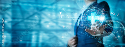 Fotografie Businessman touch virtual medical network icons