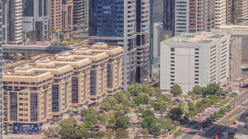 Close up view of Dubai Financial Center district with tall skyscrapers timelapse.