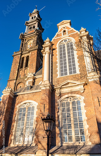 Photography The old protestant Westerkerk church in Amsterdam, located on the Prinsengracht