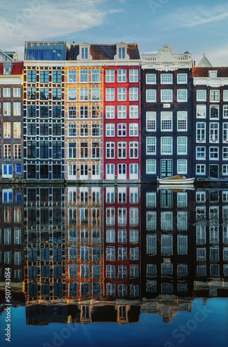 Amsterdam City Scene, typical dutch houses and their reflection in the canal.