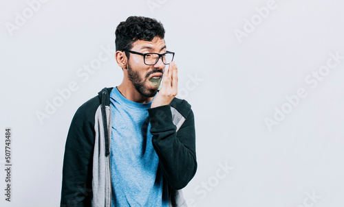 Person with bad breath problem, Concept of person with halitosis and bad breath, a guy with bad breath and halitosis problem photo