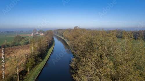 canal Dessel Schoten aerial photo in Rijkevorsel  kempen  Belgium  showing the waterway in the natural green agricultural landscape. High quality photo. High quality photo