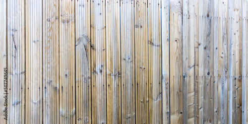 line vertical old grey wood background of wooden planks gray fence facade