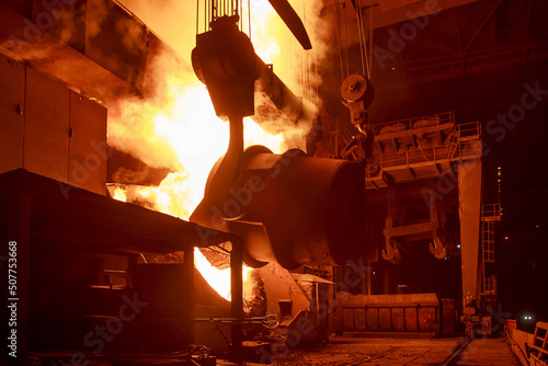 Oxygen converter process in a steel mill. photo