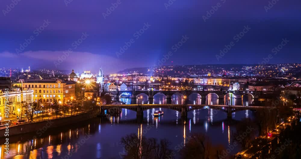 Night Prague timelapse, famous bridges and light rays of cars and boat, static view Night Prague timelapse, famous bridges and light rays of cars and boat, static view