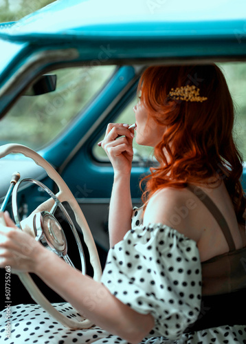 photoshoot in retro style red-haired girl and car