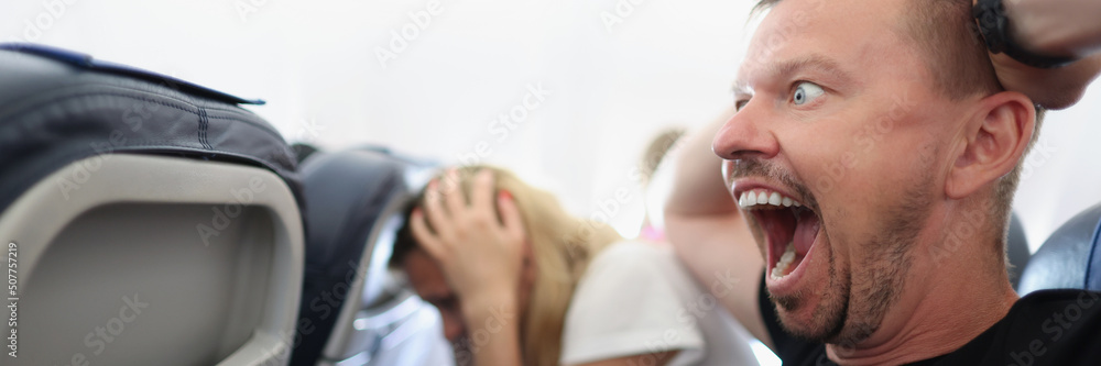 Passenger on seat worry about flight Passenger on seat worry about flight