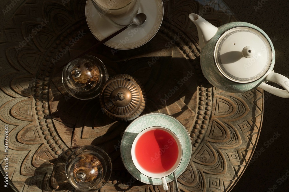 Cup of hibiscus tea on the table Cup of hibiscus tea on the table