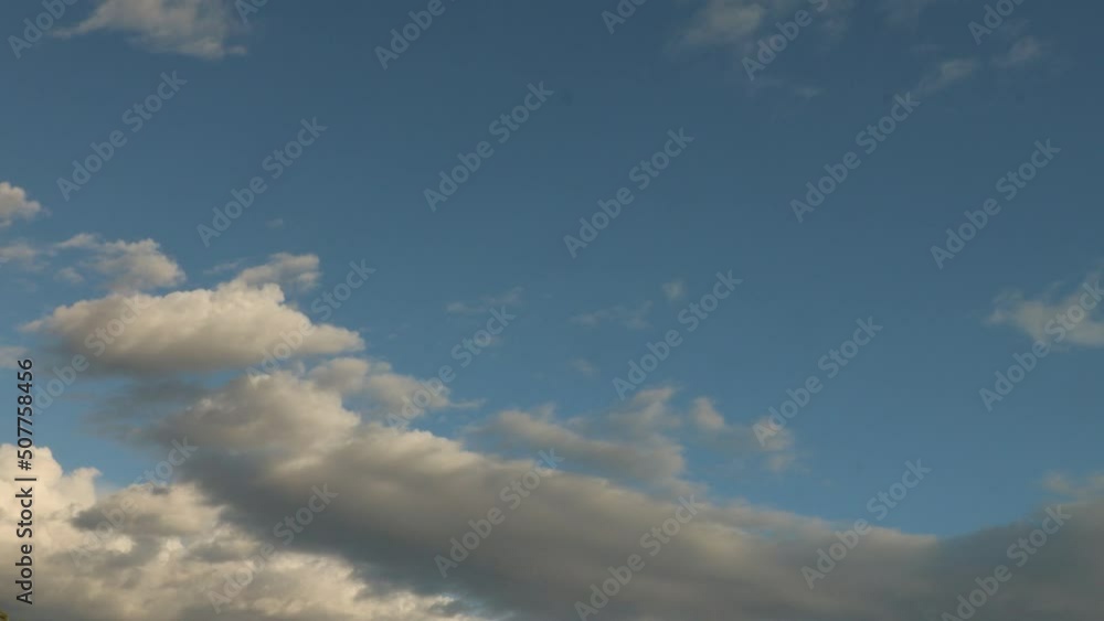Disintegrating stratocumulus clouds time-lapse from blue sky to darkness Disintegrating stratocumulus clouds time-lapse from blue sky to darkness