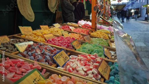 Large Counter with Colorful Sweets with Various Assorted Candy in Arribada Festival photo