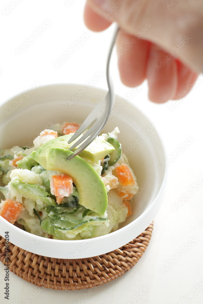 Avocado and carrot mixed mayonnaise salad with copy space Avocado and carrot mixed mayonnaise salad with copy space