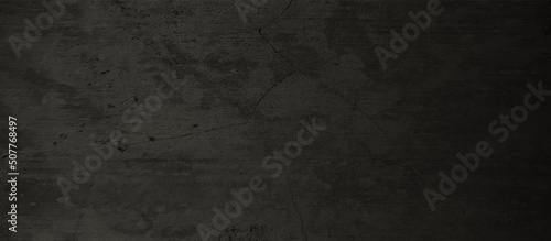 Black and white concrete wall surface texture with space for your text  Dusty dark black background with grainy element covered grunge texture for any construction related works.