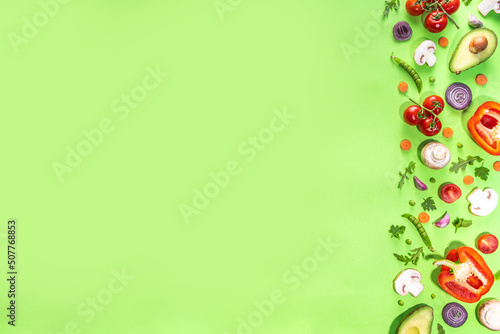 Various fresh vegetables pattern. Raw organic vegetables  salad ingredients bright flatlay on light green background. Healthy diet common diet  vegan vegetarian foodcooking background copy space