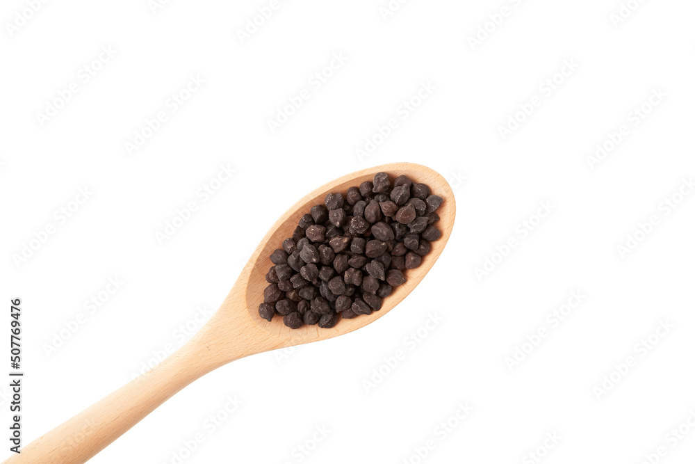 Black chickpeas in wooden spoon on white background, close-up. Design element, copy space Black chickpeas in wooden spoon on white background, close-up. Design element, copy space