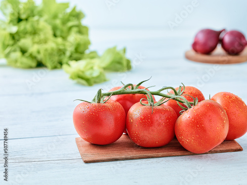 tomatoes on a wooden table