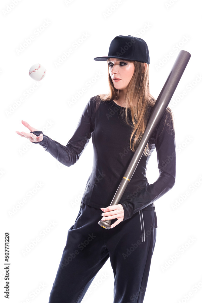 Fitness and Sport Concepts. One Sportive Caucasian Female Baseball Player Athlete Tossing Up Ball with Bat wearing Sport Outfit Against Pure White background. Fitness and Sport Concepts. One Sportive Caucasian Female Baseball Player Athlete Tossing Up Ball with Bat wearing Sport Outfit Against Pure White background.