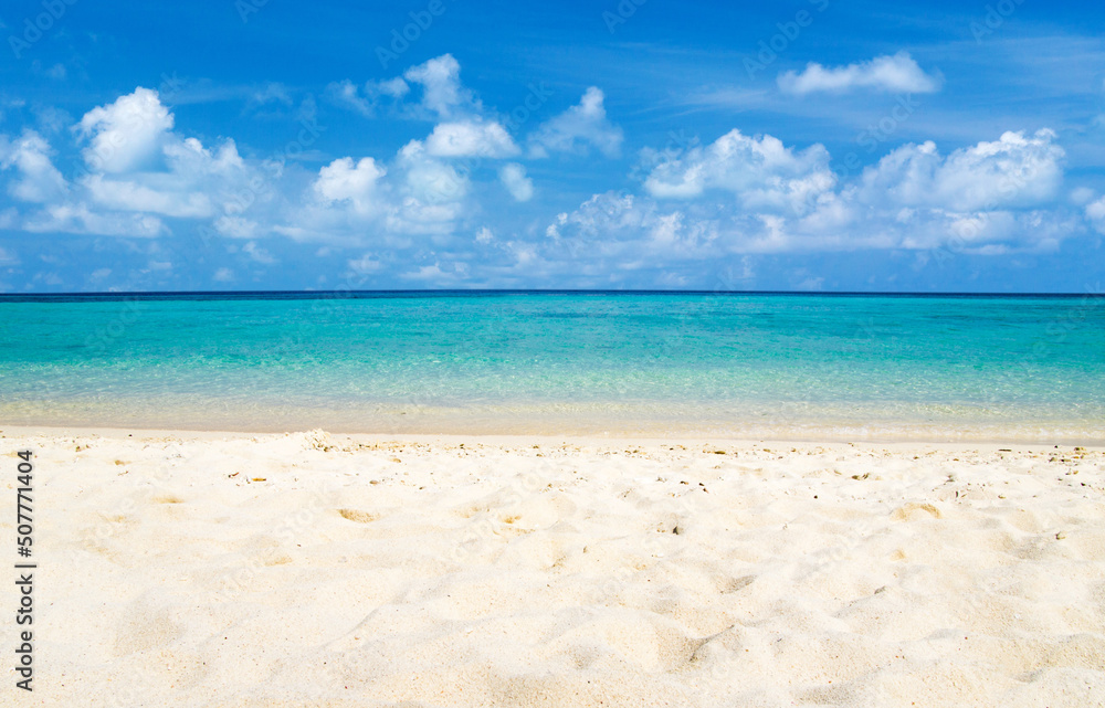 Beautiful beach with white sand. Tropical sea with cloudy blue sky . Amazing beach landscape Beautiful beach with white sand. Tropical sea with cloudy blue sky . Amazing beach landscape