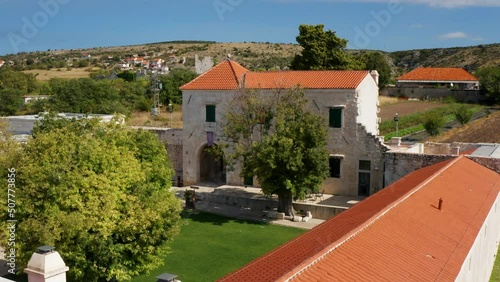 Maskovica Han Historic Ottoman Architecture In Vrana Village, Dalmatia Region Of Croatia  - aerial drone shot photo