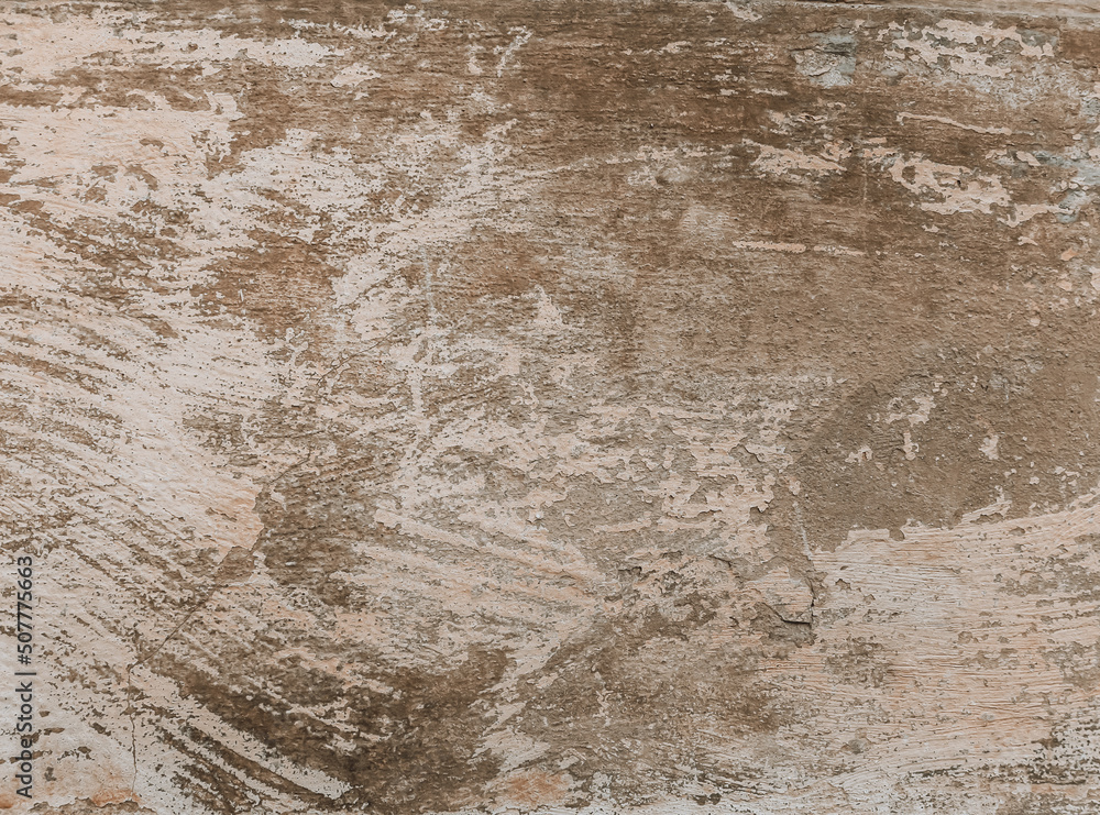 A plastered concrete surface with rough brush strokes. Paint brushed wall background with detailed texture.