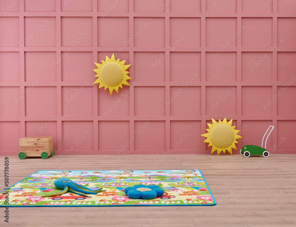 Decorative baby room, pink wall background, baby mat and carpet design,  child furniture, object, toy, hanging style. Stock Photo