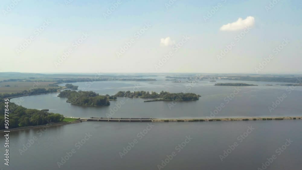 Causeway bridge over Věstonice reservoir in South Moravia, drone shot. Causeway bridge over Věstonice reservoir in South Moravia, drone shot.