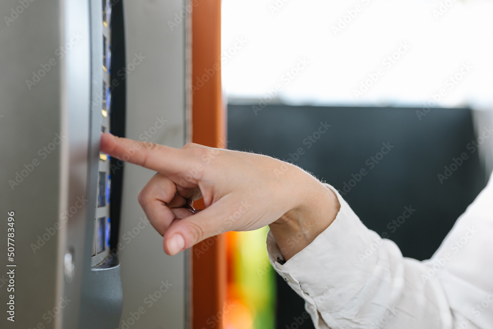 Buying soda and sweets in a vending machine