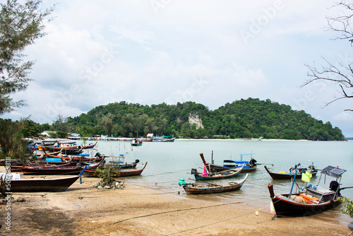 View landscape seascape and local thai fisher people floating stop boat ship in sea waiting catch fish and marine life at Pak Bara fishing village at La ngu city on April 12  2022 in Satun  Thailand
