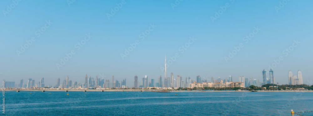 Dubai's downtown city landscape view with the sea in the front