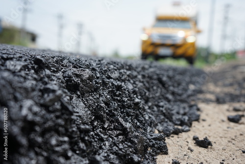 The blur of the asphalt road