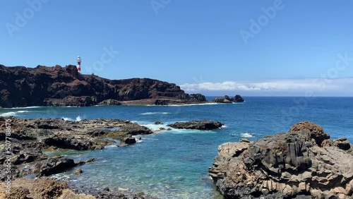 On the dramatic coast in Punta de Teno. Lighthouse. It is in the municipality of Buenavista del Norte on the Canary Island of Tenerife photo