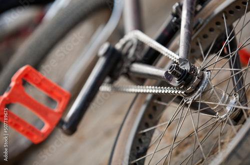 bike detail with orange pedal