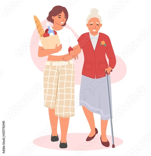 Woman help elderly female with grocery shopping