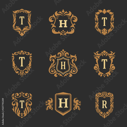 Luxury monogram logos templates vector objects set for logotype or badge design. Trendy vintage royal ornament frames illustration  good for fashion boutique  alcohol or hotel brand.