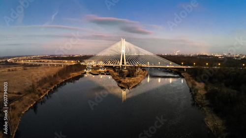 Most Rędziński na obwodnicy A8, S8 nocą z lotu ptaka drona z miastem w tle photo