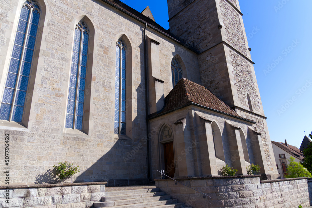 Medieval church named Pfarrkirche St. Johann at the old town of City of Rapperswil-Jona on a sunny spring day. Photo taken April 28th, 2022, Rapperswil-Jona, Switzerland.