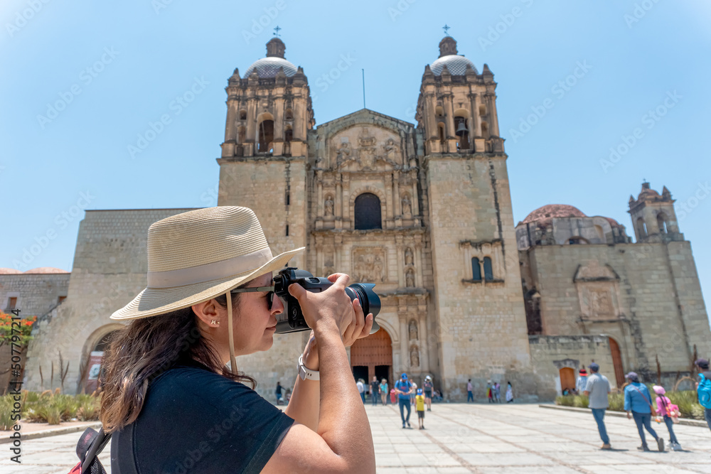 Woman Taking Pictures In Oaxaca City