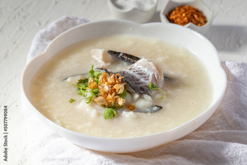 Fish porridge in a white bowl