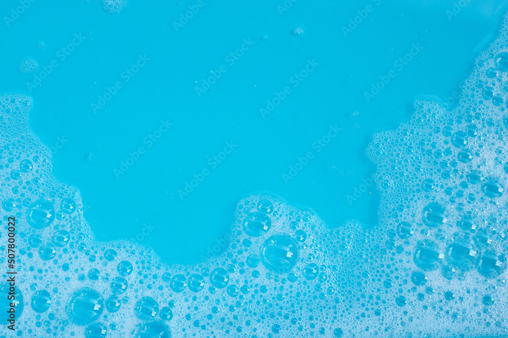 Detergent foam bubble on blue background. Detergent foam bubble on blue background.