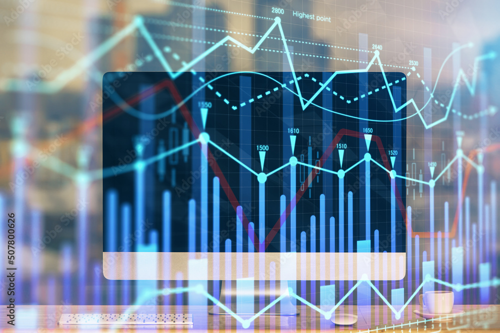 Forex market graph hologram and personal computer on background. Multi exposure. Concept of investment. Forex market graph hologram and personal computer on background. Multi exposure. Concept of investment.